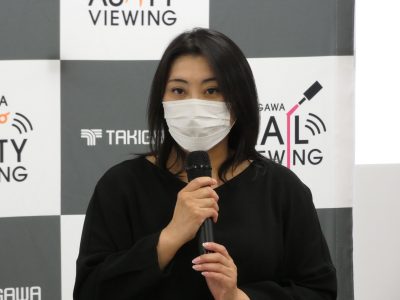 会場からメッセージを発する滝川㈱・滝川睦子会長兼社長